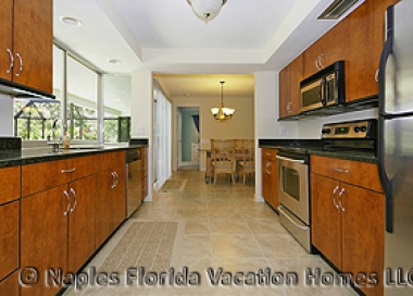 Naples Florida Vacation Homes | Monte Carlo Home: Kitched to Dining Room
