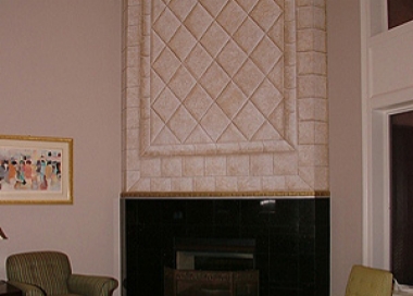 Naples Florida Vacation Homes | Sorrento Home: Fireplace Separating the Great Room and Master Suite